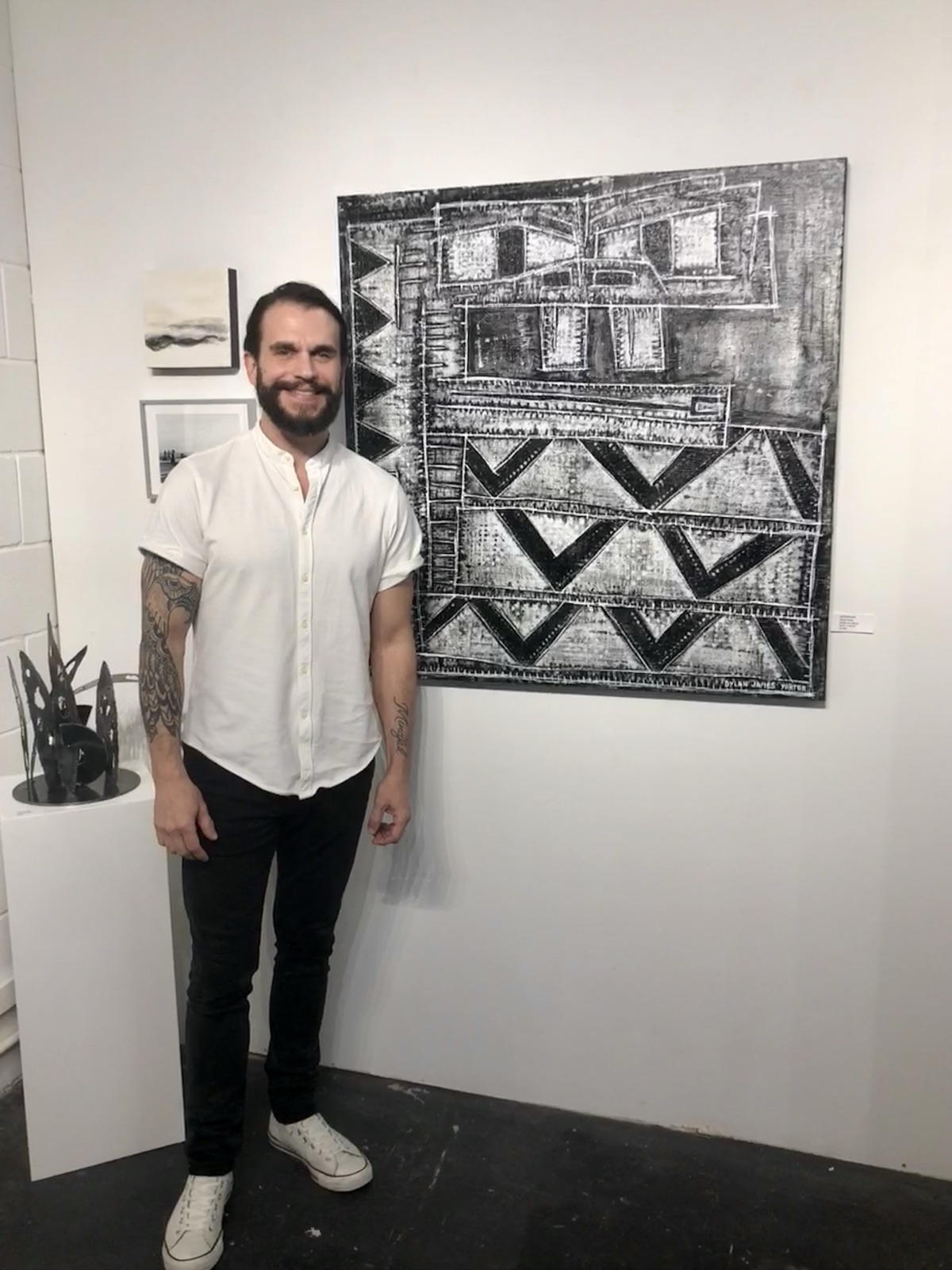 Dylan Yarter with his painting "Rattlesnake" installed at RTown Gallery, Grapevine, Texas, October 2023